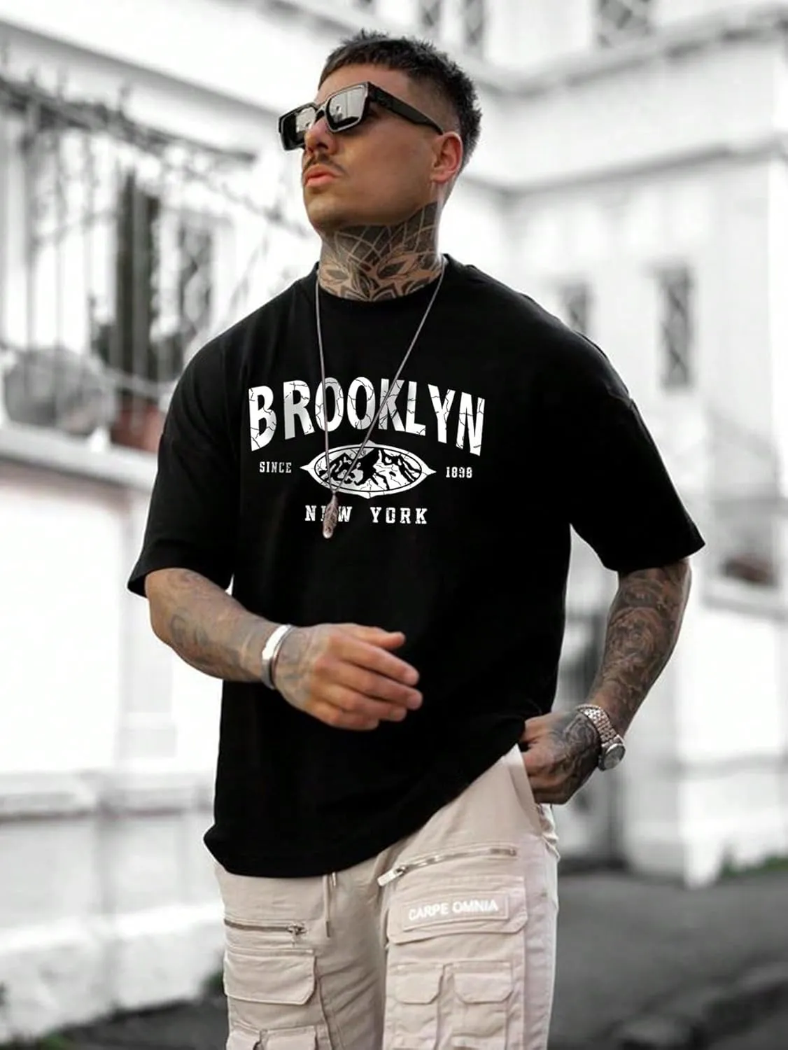SweatyRocks Men's Letter Graphic Tee Short Sleeve Round Neck Drop Shoulder Top T-Shirt