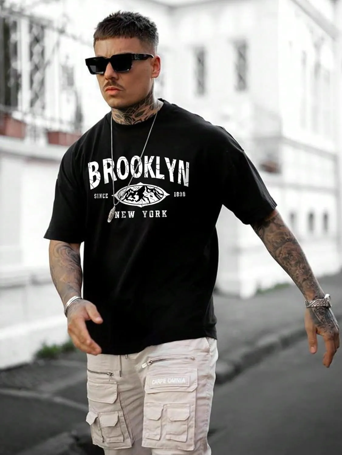 SweatyRocks Men's Letter Graphic Tee Short Sleeve Round Neck Drop Shoulder Top T-Shirt